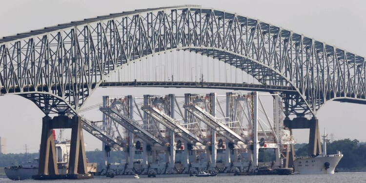 Baltimore's Francis Scott Key Bridge collapses after ship struck it, sending vehicles into water