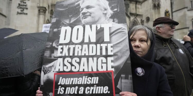 U.K. court says Assange can't be extradited on espionage charges until U.S. rules out death penalty