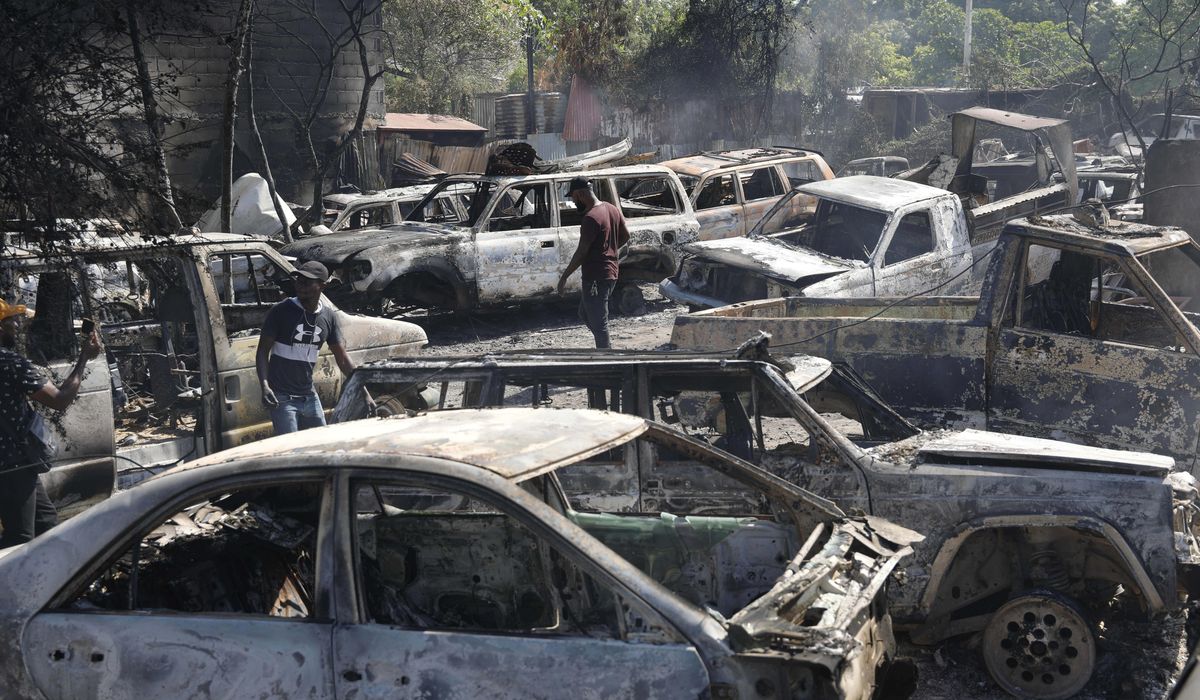 Police in Haiti say 2 men were hacked to death by mob who thought they were buying ammo for gangs