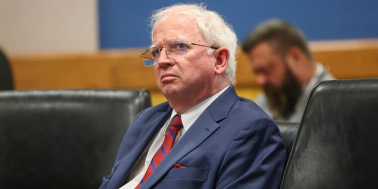 John Eastman sitting in Fulton Superior Court during a hearing