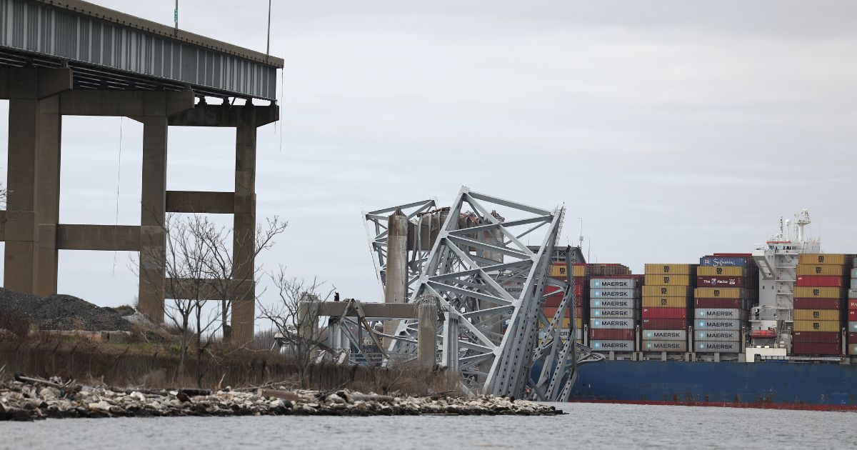 The cargo ship Dali sits in the water after running into and collapsing the Francis Scott Key Bridge in Baltimore, Maryland, on Tuesday.