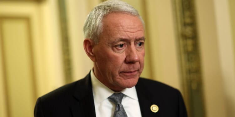 Rep. Ken Buck leaves the House Chamber at the U.S. Capitol in Washington on Feb. 6.