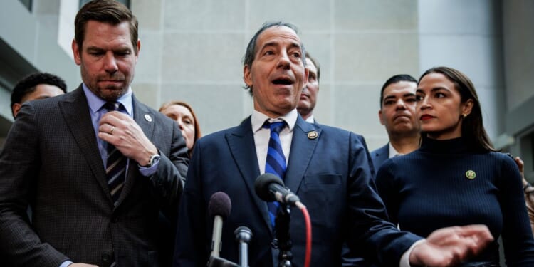 Democratic Rep. Jamie Raskin, center, speaks during a news conference - surrounded by other House Democrats - during a break in the deposition of Hunter Biden in Washington, D.C., on Wednesday.