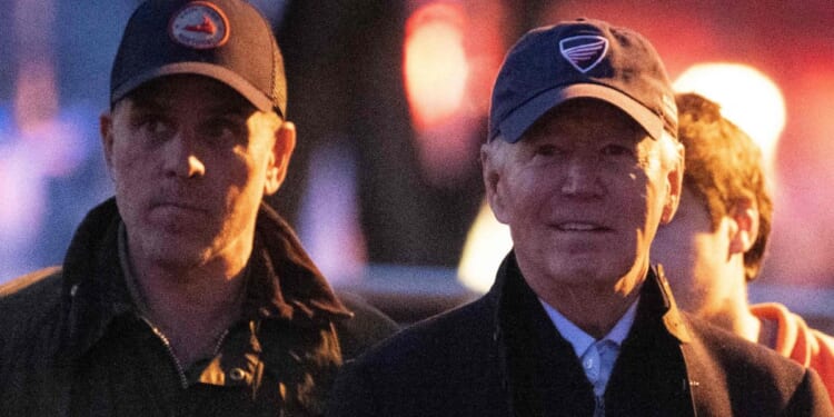 Hunter Biden, left, and President Joe Biden, right, attend a Christmas tree lighting in Nantucket, Massachusetts, on Nov. 24.