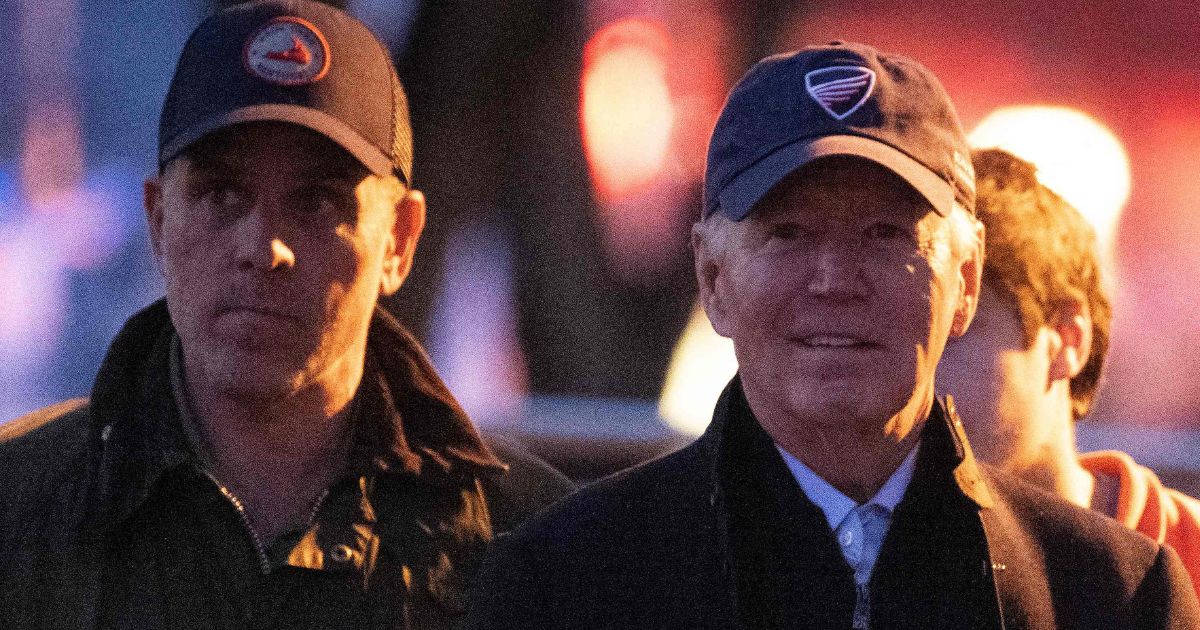 Hunter Biden, left, and President Joe Biden, right, attend a Christmas tree lighting in Nantucket, Massachusetts, on Nov. 24.