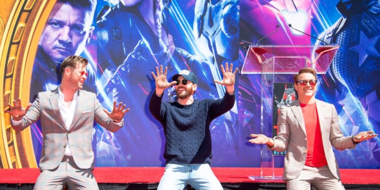 Actors. from left, Chris Hemsworth, Chris Evans and Robert Downey Jr. attend the Marvel Studios' "Avengers: Endgame" cast place their hand prints in cement at TCL Chinese Theatre IMAX Forecourt on April 23, 2019, in Hollywood.