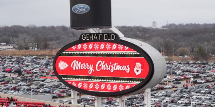 The video board at Arrowhead Stadium in Kansas City, Missouri, displays "Merry Christmas" to fans during the NFL's Christmas Day game be