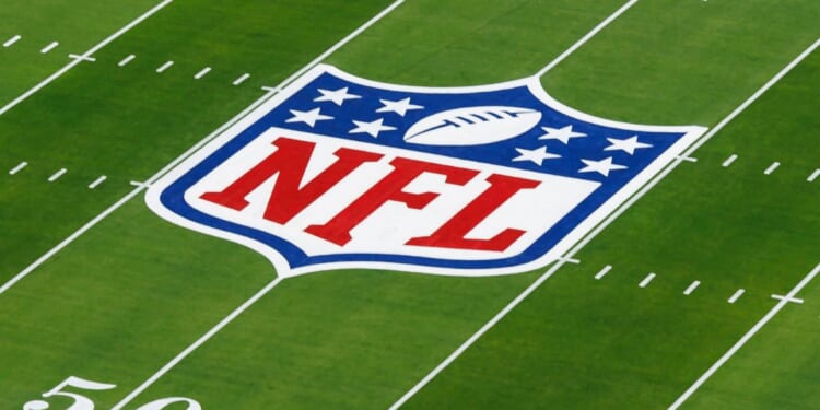 The NFL shield logo painted on the field before Super Bowl LVIII between the Kansas City Chiefs and San Francisco 49ers in Las Vegas, Nevada, on Feb. 11.