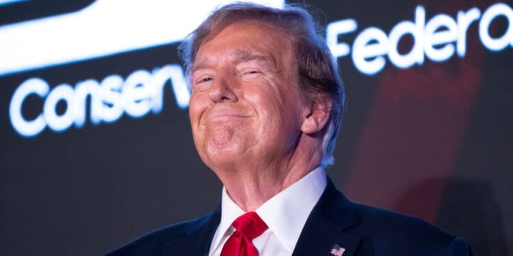 Former President Donald Trump smiles during the Black Conservative Federation Gala in Columbia, South Carolina, on Feb. 23.