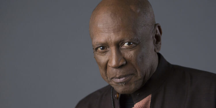 Louis Gossett Jr. posing for a portrait