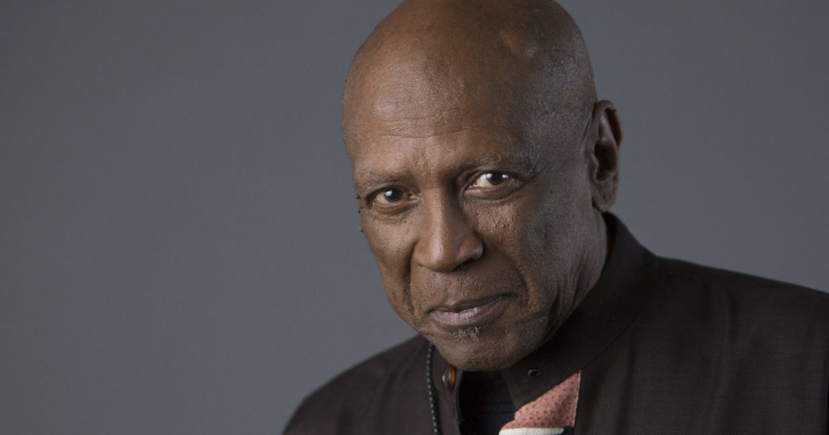 Louis Gossett Jr. posing for a portrait