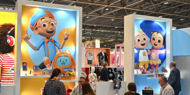 Posters showing Blippi and Cocomelon characters are displayed at the Moonbug Entertainment stand during the Brand Licensing Europe at ExCel on October 4, 2023 in London, England.