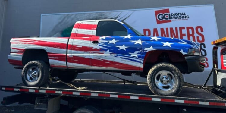 A student at an Indiana high school was ordered by school officials to remove the American flag he attached to his truck and flew in the school parking lot. A local business responded by wrapping the flag permanently on the truck for free.