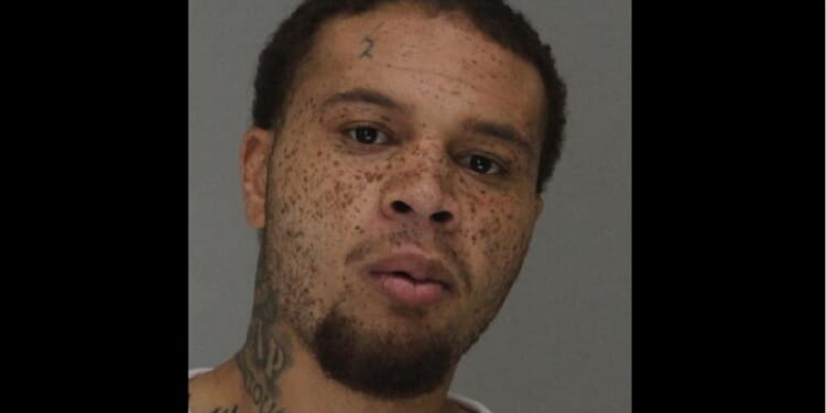 Darion Thomas, the suspect in a car theft that led to a woman's death in Dallas early Sunday.