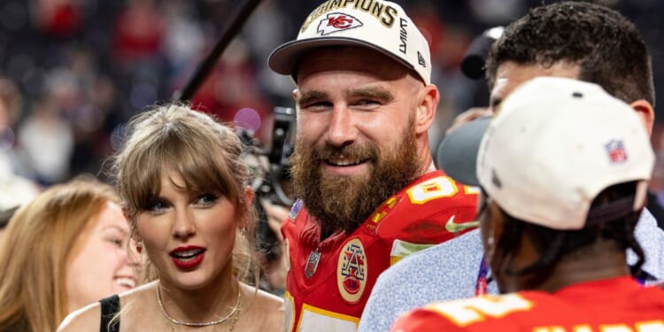 Travis Kelce and Taylor Swift celebrate after the Kansas City Chiefs beat the San Francisco 49ers in the Super Bowl at Allegiant Stadium in Las Vegas on Feb. 11.