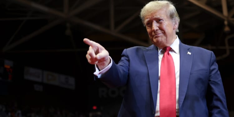 Former President Donald Trump grins as he greets the crowd in a file photo from Feb. 23 in Rock Hill, South Carolina.