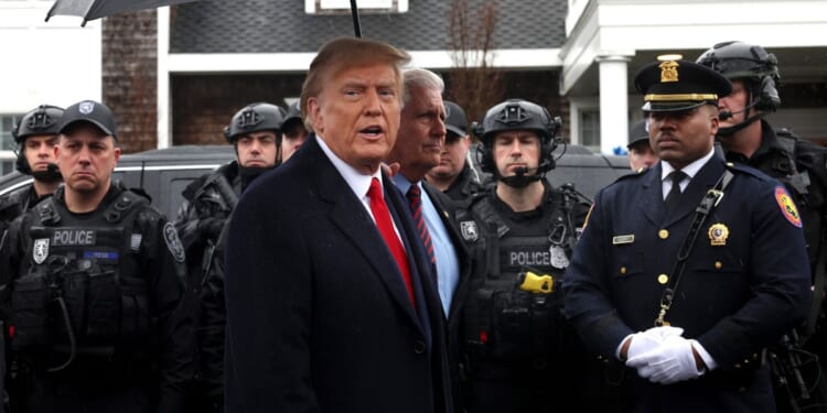 Former President Donald Trump speaks to the media after attending the wake of slain NYPD Officer Jonathan Diller on Thursday at a funeral home in Massapequa, New York.