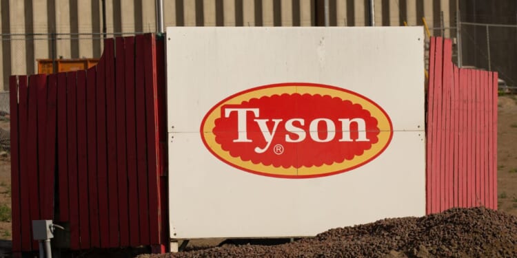 A sign at the entrance to a Tyson Fresh Meats plant in Wallula, Washington in a file photo from 2020. The company is under fire for laying off 1,000 workers in Iowa while hiring thousands of illegal immigrants elsewhere.