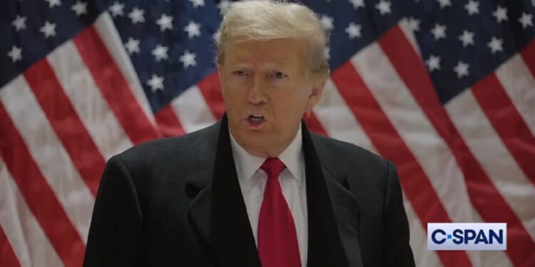 Former President Donald Trump addresses a news conference on Monday.