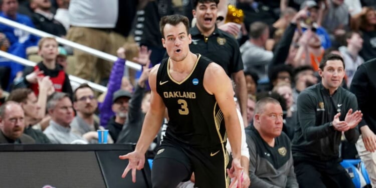 Oakland's Jack Gohlke reacts after hitting a 3-point shot against Kentucky in the first round of the men's NCAA Tournament in Pittsburgh on Thursday.