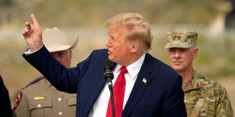 Donald Trump pointing to Mexico at Shelby Park in Eagle Pass, Texas