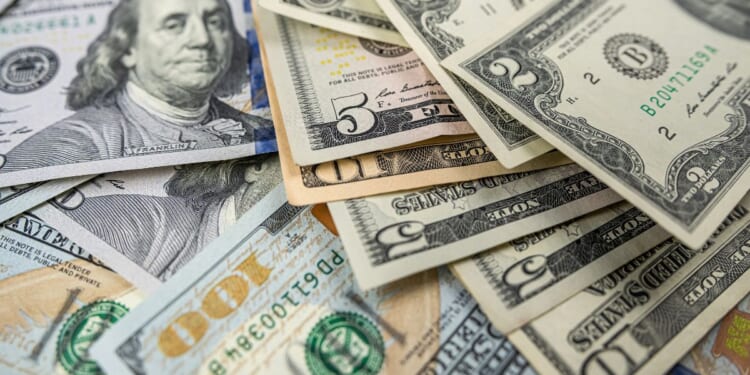 This Getty stock image depicts multiple denominations of U.S. currency.