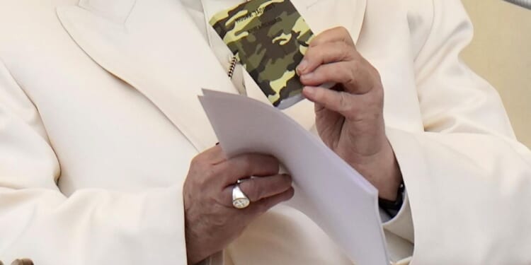 Pope Francis shows off rosary of slain Ukrainian soldier, denounces 'madness of war'