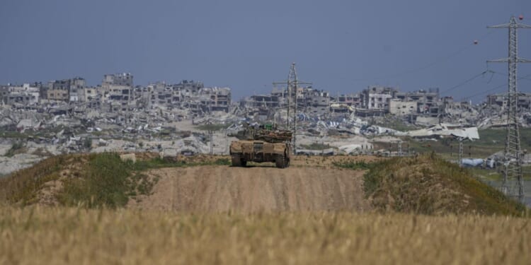 Bodies of six foreign aid workers slain in Israeli strikes are transported out of Gaza