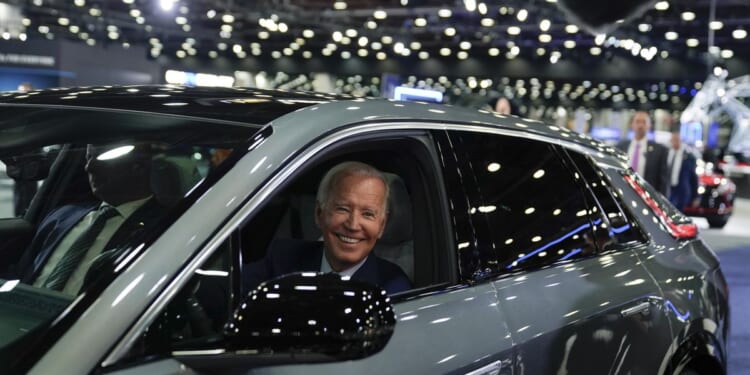 Ad blitz scorches at-risk Senate Democrats over Biden's EV mandate