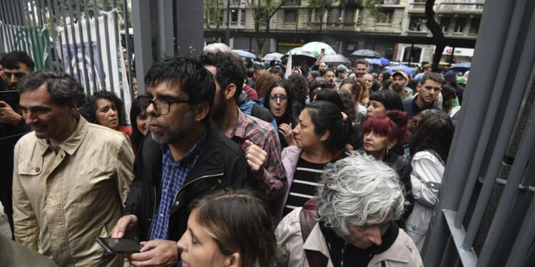 Argentina's Milei takes his chainsaw to the state, cutting 15,000 jobs and spurring protests