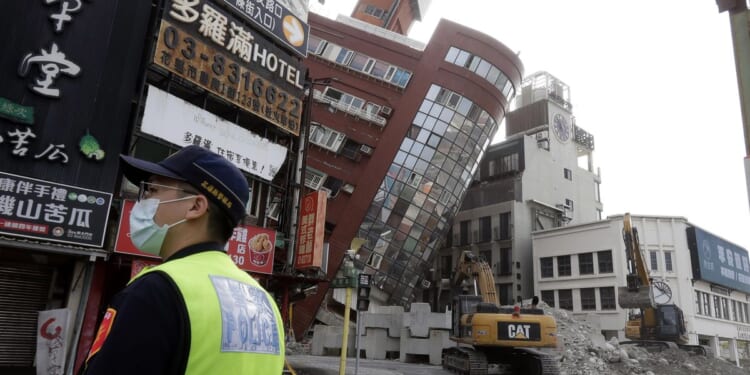 Rescuers in Taiwan search for those missing after major earthquake