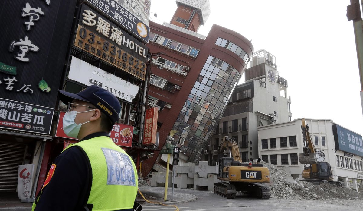 Rescuers in Taiwan search for those missing after major earthquake