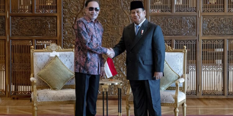 Indonesia's president-elect talks with Malaysian leader about bolstering ties