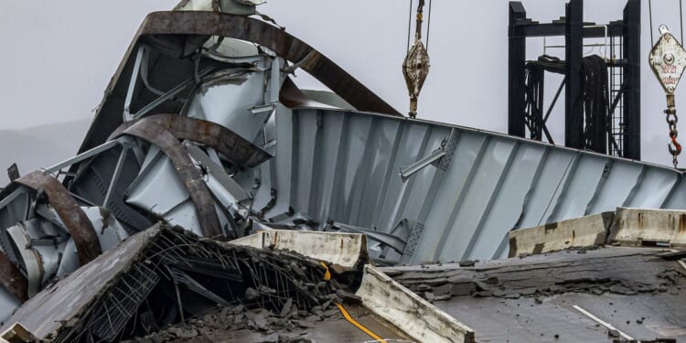 President Biden tours Baltimore Key Bridge wreckage, vows swift rebuild