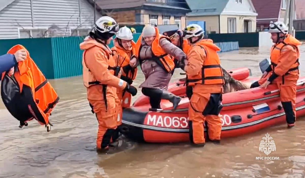 Thousands are evacuated after floods break a dam in the Russian city of Orsk