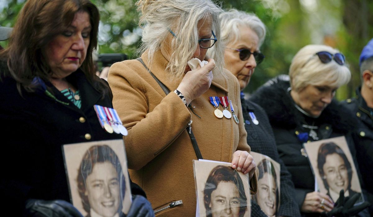 Hundreds pay tribute to police officer fatally shot 40 years ago from inside Libya's U.K. embassy