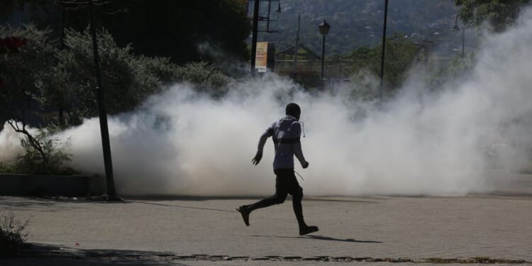 U.S. deports about 50 Haitians, ending monthslong pause in flights