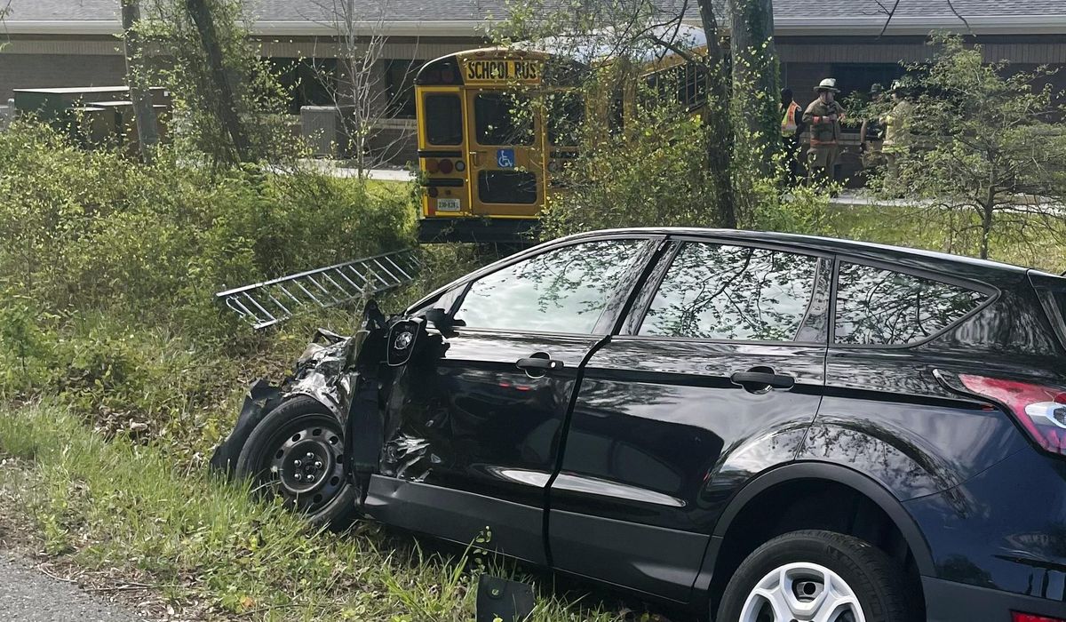 Fairfax County, Virginia, school bus hits DMV building, injures driver, two students, officials say