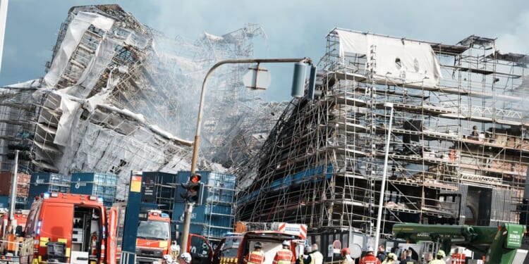 Firefighters to tackle scaffolding dangling outside ruins of fire-ravaged Danish landmark