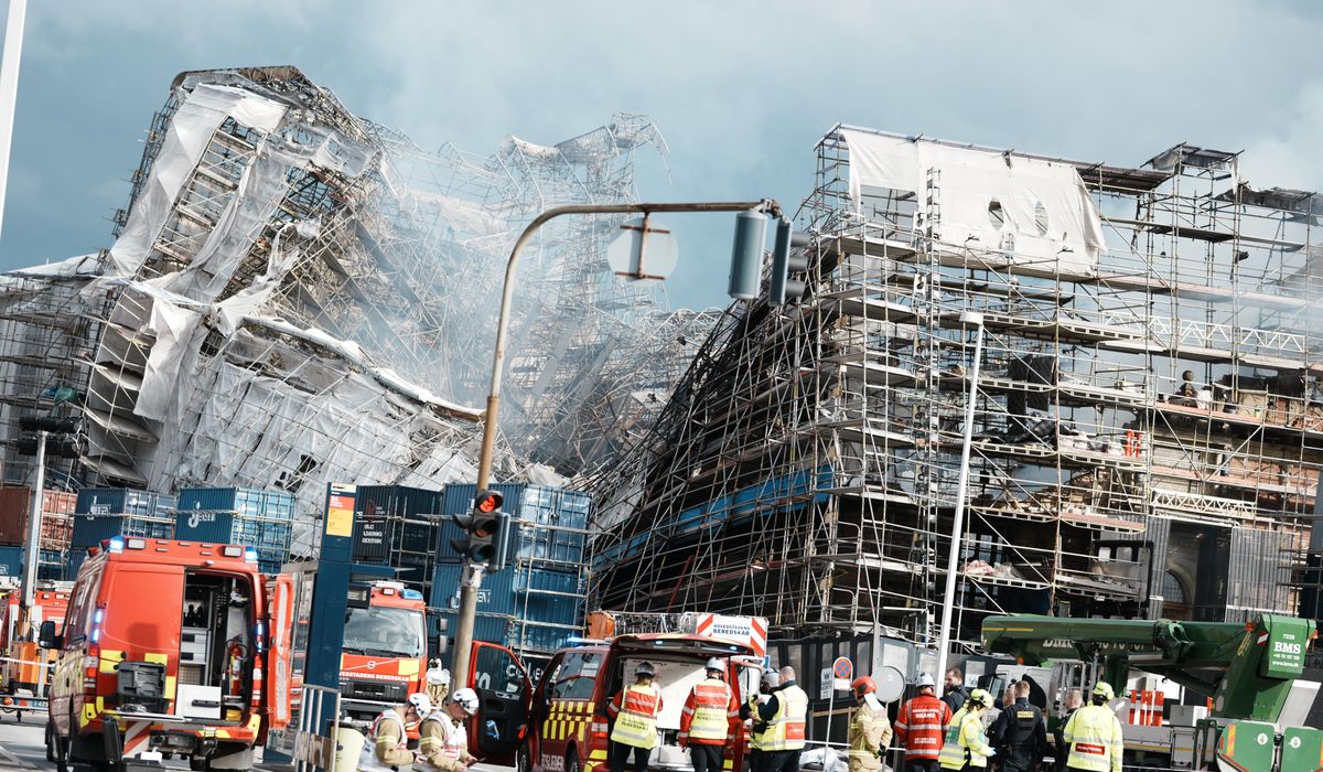 Firefighters to tackle scaffolding dangling outside ruins of fire-ravaged Danish landmark