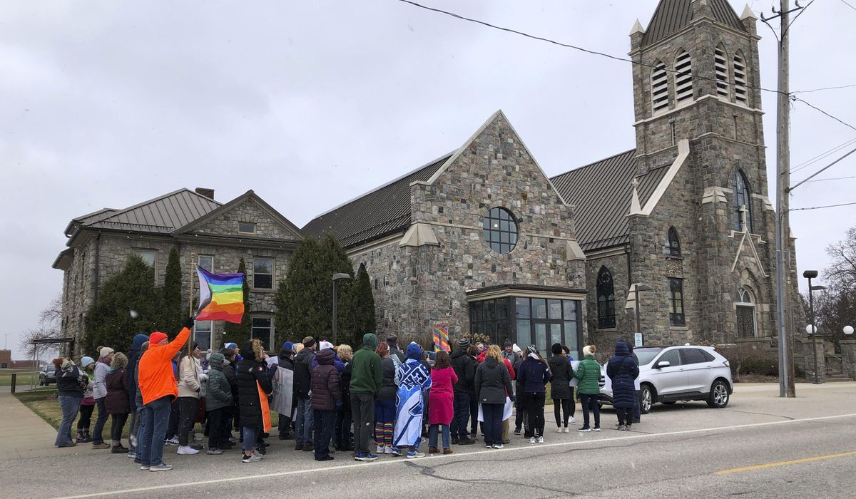 Catholic priest resigns as pastor of Michigan church after protests over his criticism of gay author