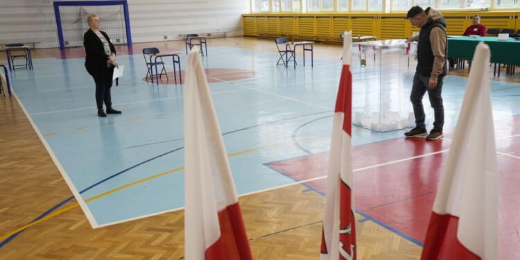 Voters in Poland choose mayors in hundreds of cities in runoff election