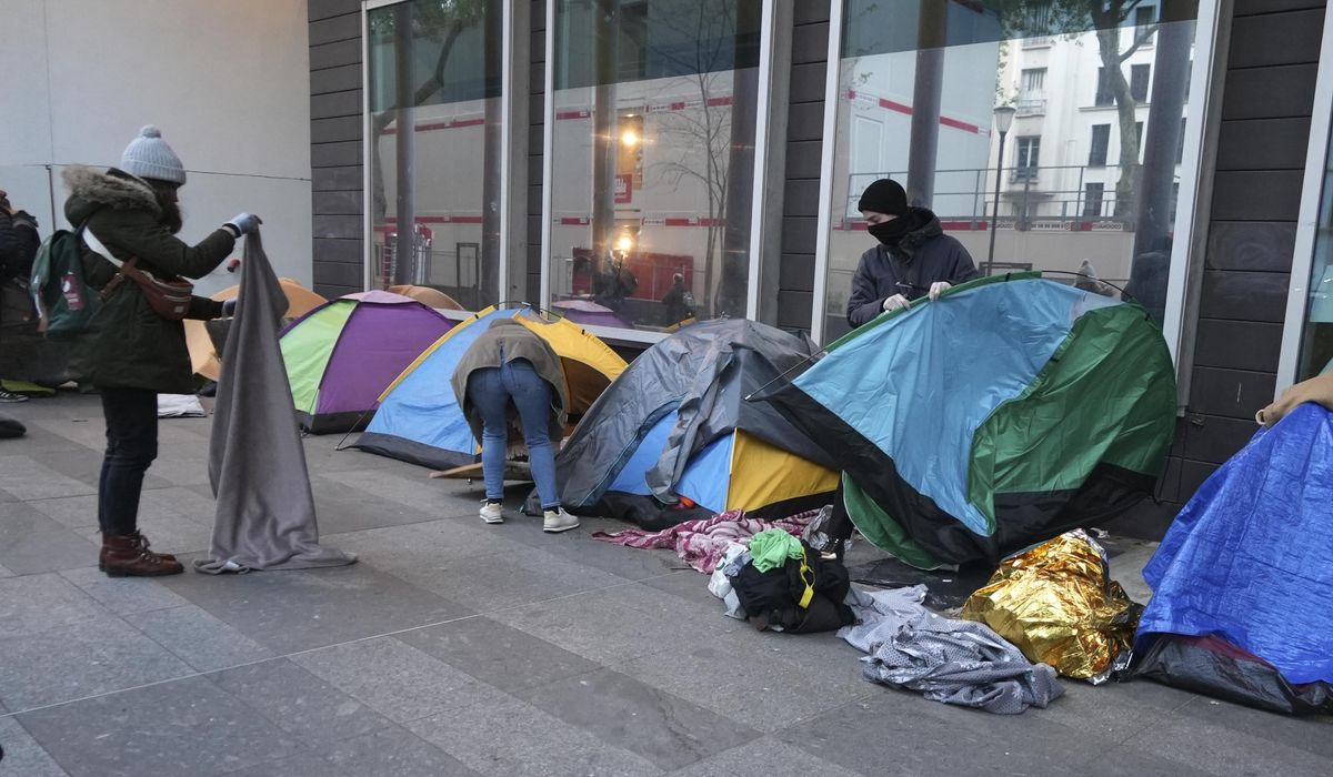 Migrant camp in central Paris cleared out by police. Activists say it's a pre-Olympics sweep