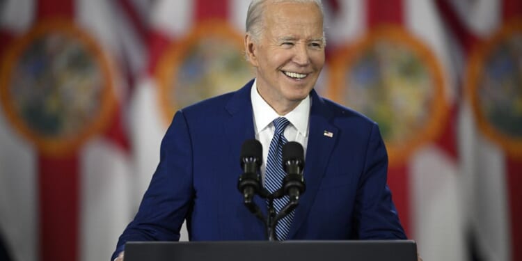 Joe Biden accused of mocking Catholicism for making sign of cross during abortion rally