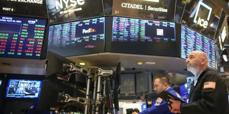 Wall Street falls on double dose of disappointing economic data