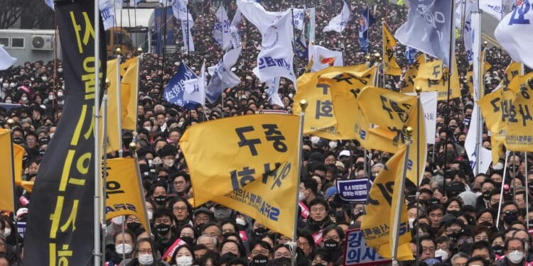 Police in South Korea raid office of incoming head of doctors' group over protracted strikes