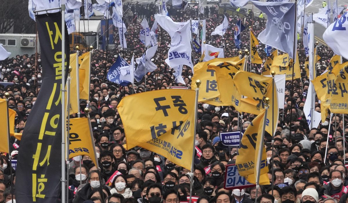 Police in South Korea raid office of incoming head of doctors' group over protracted strikes