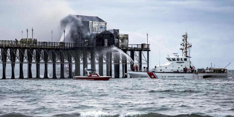 Firefighters contain fire on landmark wooden pier on the Southern California coast