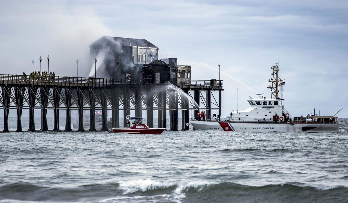 Firefighters contain fire on landmark wooden pier on the Southern California coast