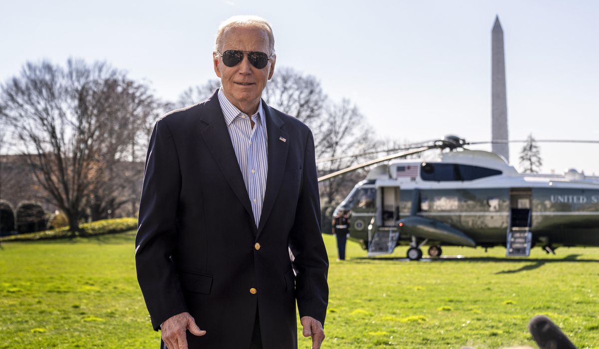 Biden's aides flank him to Marine One to block cameras from catching him shuffling